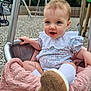 Frankie joined the competition — help win amazing prizes! baby, child, swing, playground, shoe, sock, blanket, knitted, outdoor, smiling, face, person, clothing, wood, metal, fence, trees, grass, happy, cute