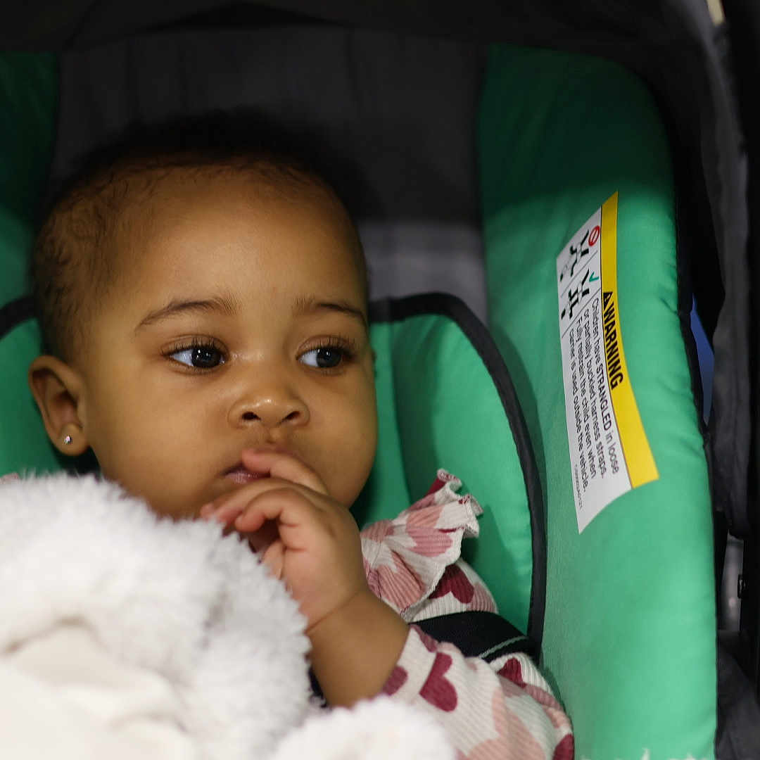 Zenab joined the competition — help win amazing prizes! baby, bed, bodypart, car, car_interior, crib, cushion, face, finger, furniture, hand, head, homedecor, infantbed, person, photography, portrait, stroller, transportation, vehicle