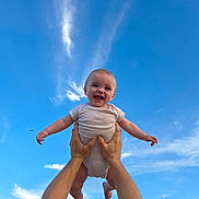Remington joined the competition — help win amazing prizes! baby, child, smiling, happy, hands, arms, sky, blue_sky, clouds, outdoor, person, infant, joy, playful, lifting, portrait, cute, daylight, nature, fun