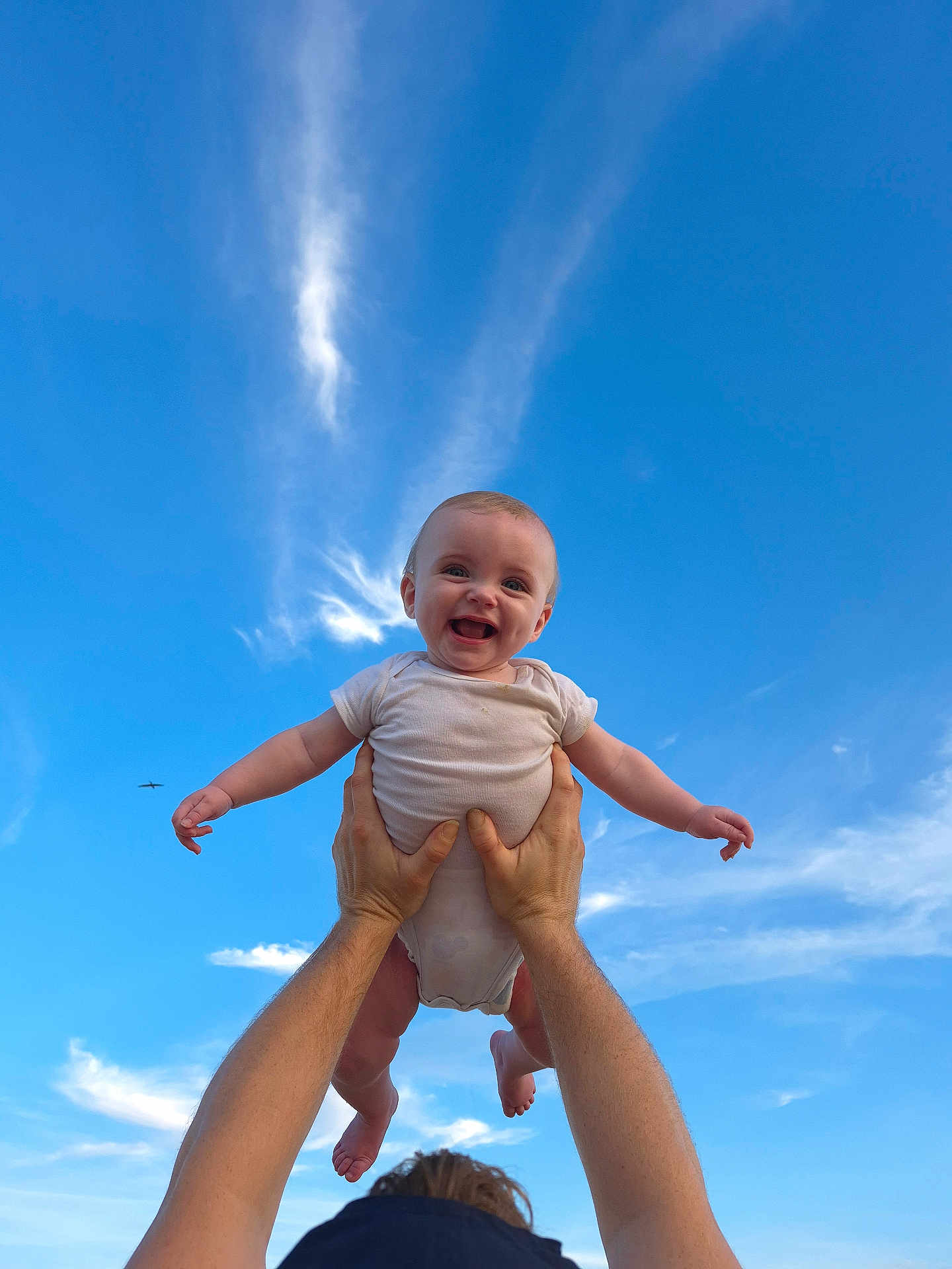 Remington joined the competition — help win amazing prizes! baby, child, smiling, happy, hands, arms, sky, blue_sky, clouds, outdoor, person, infant, joy, playful, lifting, portrait, cute, daylight, nature, fun
