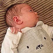 Reuben joined the competition — help win amazing prizes! baby, newborn, infant, child, sleeping, clothing, onesie, blanket, soft, cute, face, hand, portrait, resting, young, small, cozy, fabric, texture, lying