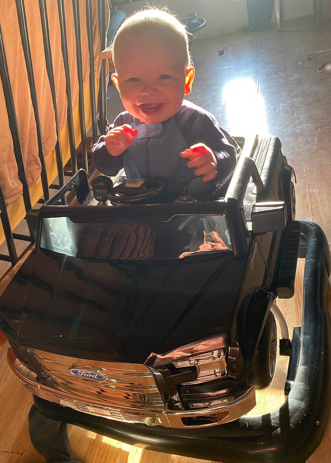 Phoenix is registered to the contest to win money with this photo: automotive_design, automotive_lighting, automotive_tire, baby, baby_carriage, baby_products, baby_safety, baby_toddler_clothing, bumper, child, comfort, head, infant_bed, motor_vehicle, person, sitting, smile, tire, toddler, vehicle