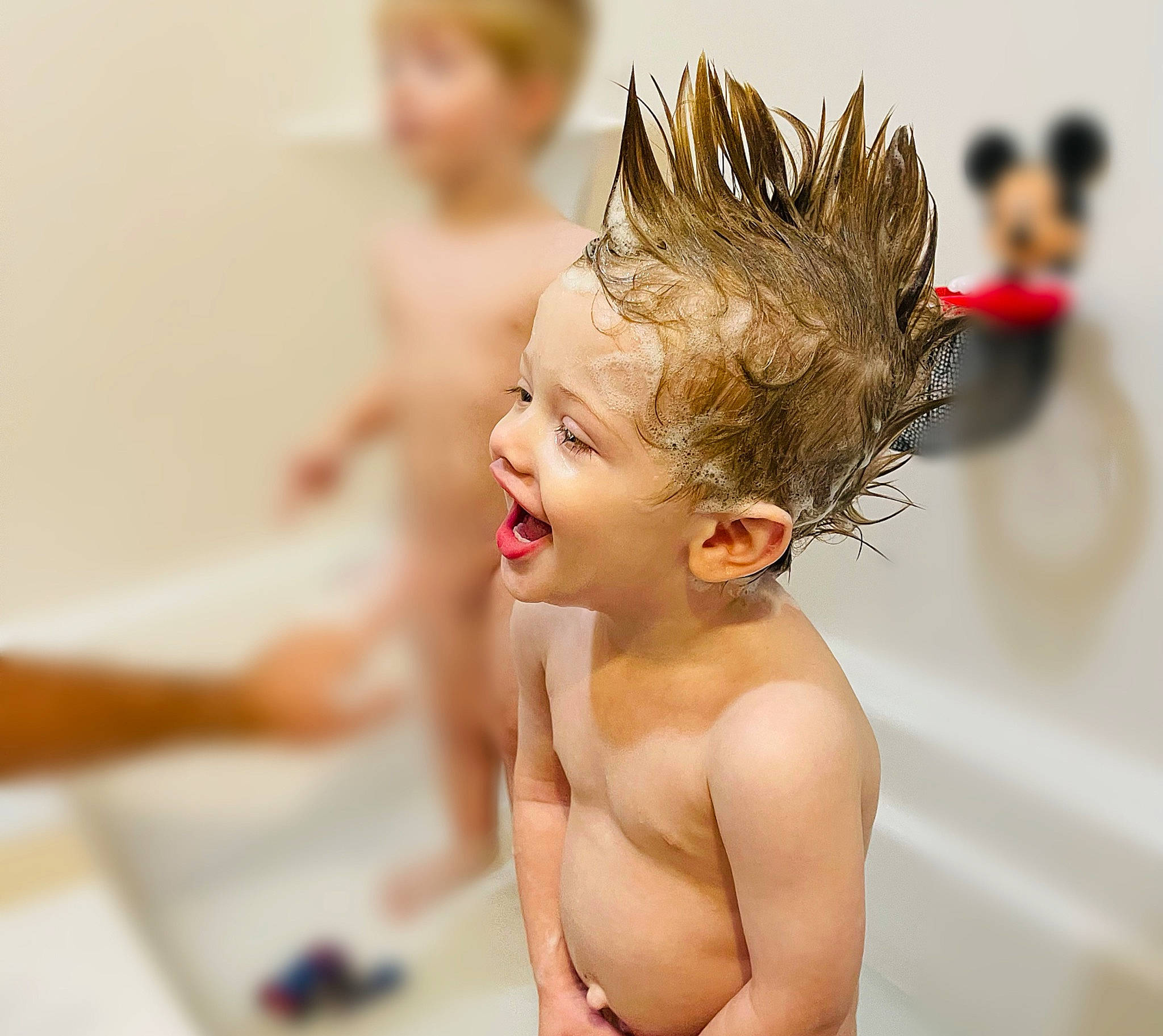 Emmett is registered to the contest to win money with this photo: barechested, bathing, blond, blurred, chest, child, eyelash, fashion_accessory, fun, gesture, hair_accessory, happy, headpiece, laugh, leisure, people_on_beach, person, recreation, smile, swimming_pool