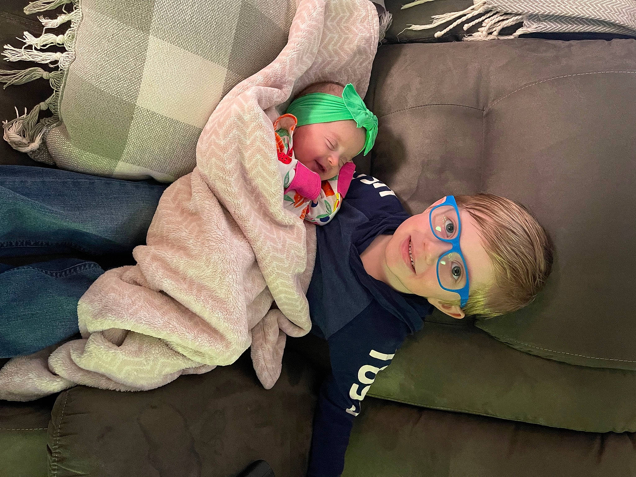 Calliope is registered to the contest to win money with this photo: baby, baby_products, baby_sleeping, baby_toddler_clothing, cheek, child, comfort, couch, eye, finger, fun, happy, hat, joy, linens, person, room, sitting, sleeve, toddler