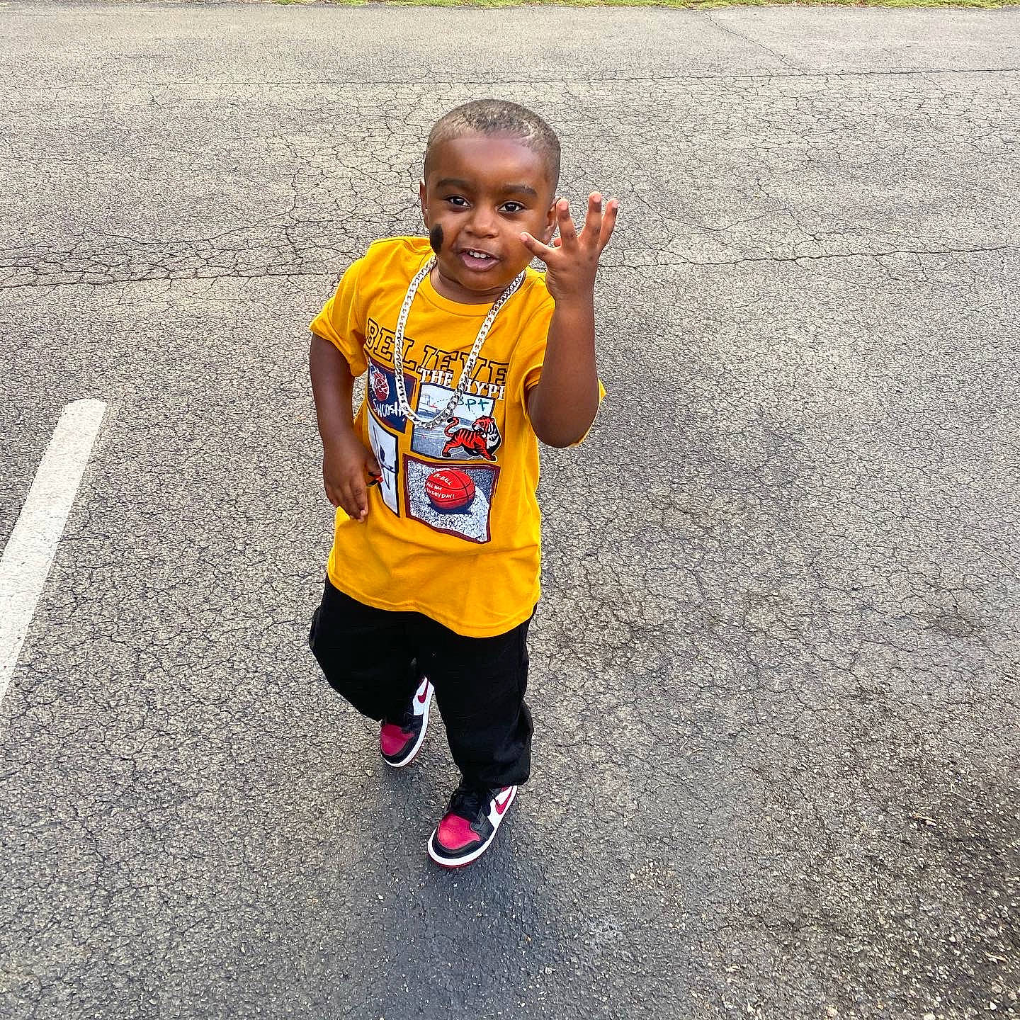 Zyion is registered to the contest to win money with this photo: asphalt, athlete, athletics, child, exercise, face, hair, happy, leisure, person, recreation, road, road_surface, running, shorts, sleeve, sneakers, sports, street_fashion, t_shirt