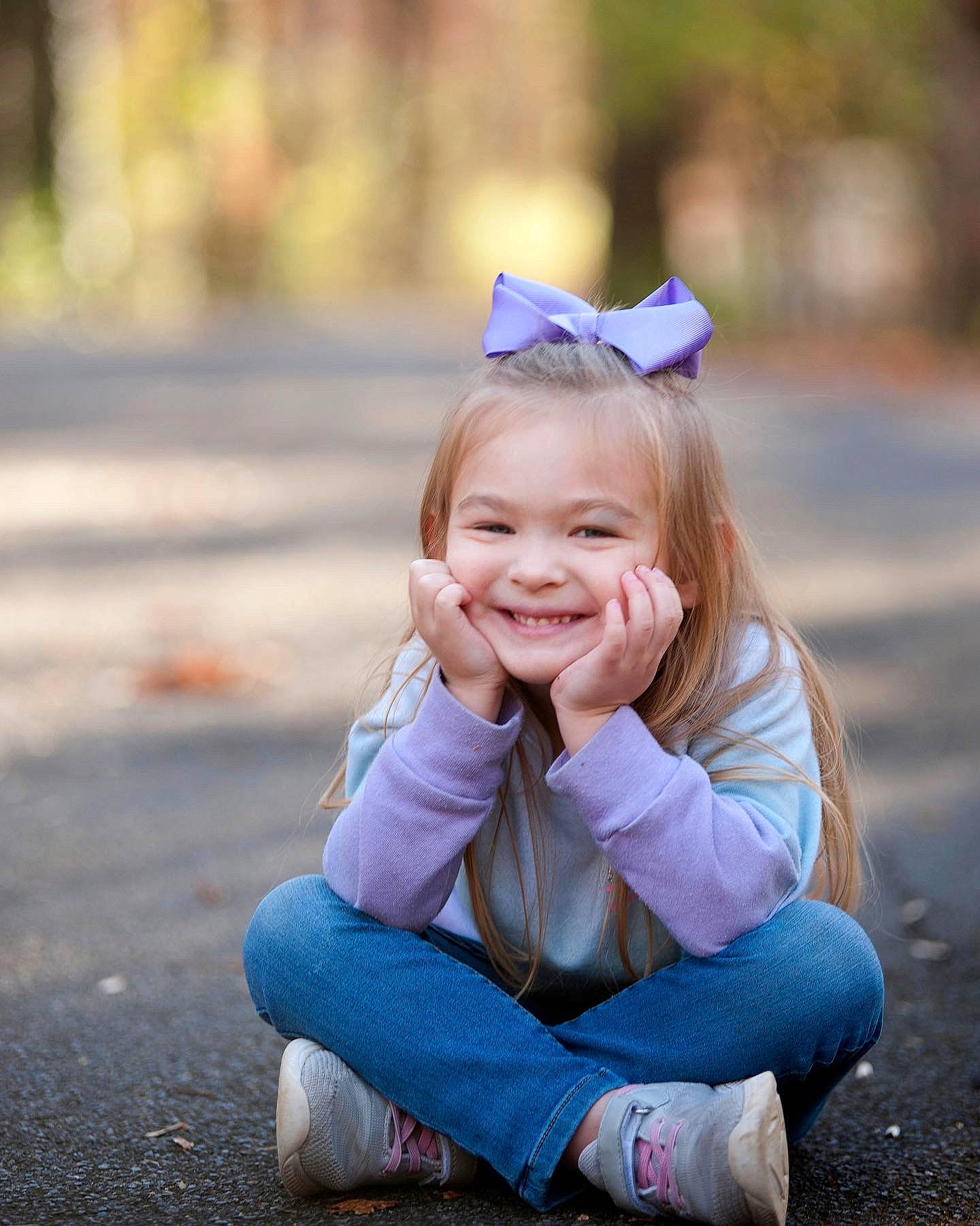 Jewell is registered to the contest to win money with this photo: beauty, blond, child, electric_blue, flash_photography, fun, grass, happy, headpiece, iris, joy, leaf, people_in_nature, person, plant, recreation, sitting, skin, smile, summer