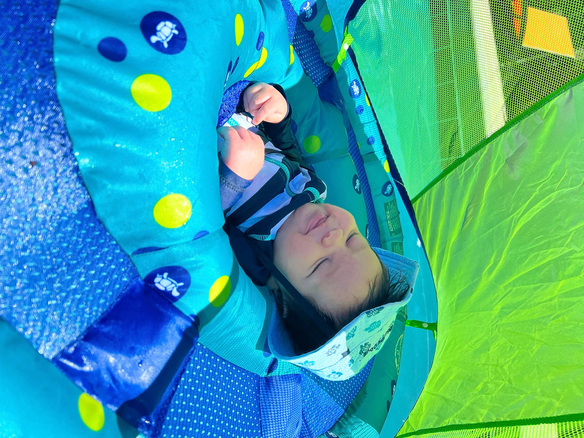 Jett is registered to the contest to win money with this photo: baby, baby_products, baby_toddler_clothing, blue, child, electric_blue, fashion_accessory, fun, grass, green, happy, leisure, organism, people_in_nature, person, plastic, recreation, shade, tints_and_shades, toddler