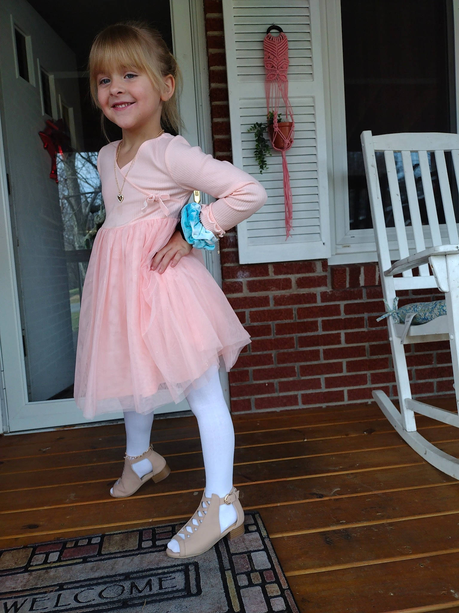 Jayde joined the competition — help win amazing prizes! blond, chair, day_dress, dress, face, fashion_design, flash_photography, flooring, formal_wear, happy, human_leg, joy, leg, one_piece_garment, pattern, person, pink, smile, thigh, toddler