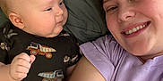 Jack joined the competition — help win amazing prizes! baby, child, woman, smile, selfie, blanket, onesie, pattern, dump_truck, curious, face, skin, head, person, clothing, indoor, casual, happy, closeup, family