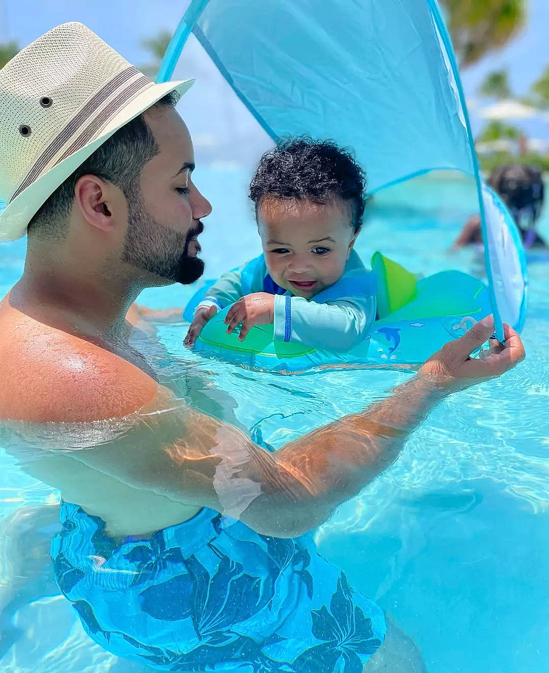 Jalen joined the competition — help win amazing prizes! aqua, azure, blue, facial_expression, fedora, fun, happy, hat, human, interaction, joy, leisure, muscle, outdoor_recreation, person, photograph, pool, product, recreation, swimming_pool
