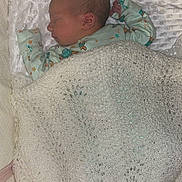 Lara joined the competition — help win amazing prizes! baby, bed, blanket, child, cozy, cute, fabric, indoor, infant, knitted_blanket, newborn, onesie, pastel_colors, peaceful, portrait, resting, sleeping, small_hands, soft_texture, turtle_pattern