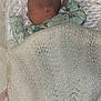 Lara joined the competition — help win amazing prizes! newborn, baby, sleeping, blanket, knitted_blanket, onesie, turtle_pattern, infant, cozy, soft_texture, pastel_colors, peaceful, resting, child, indoor, portrait, cute, small_hands, fabric, bed