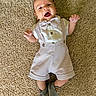 Kenzo joined the competition — help win amazing prizes! baby, infant, child, carpet, bow_tie, suspenders, shirt, shorts, shoes, smile, happy, cute, fashion, portrait, indoors, person, lying_down, hands_up, feet, apparel