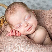 Luna joined the competition — help win amazing prizes! baby, newborn, sleeping, blanket, basket, cozy, peaceful, infant, skin, face, hand, resting, knitted, soft, cute, portrait, child, relaxation, closeup, nursery