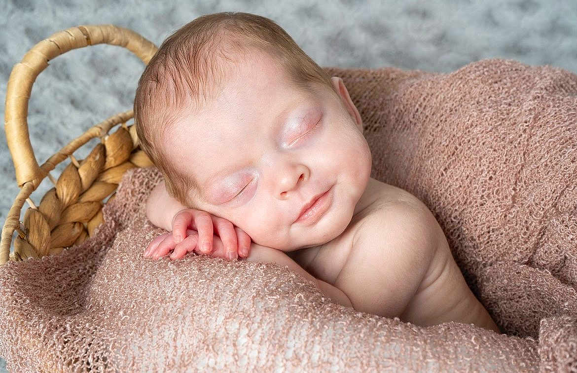 Luna joined the competition — help win amazing prizes! baby, newborn, sleeping, blanket, basket, cozy, peaceful, infant, skin, face, hand, resting, knitted, soft, cute, portrait, child, relaxation, closeup, nursery