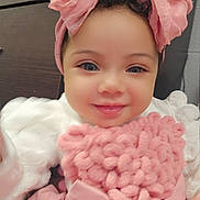 Sky Roberts is registered to the contest to win money with this photo: baby, child, pink_bow, heart, smile, cute, infant, clothing, pink_dress, headband, face, portrait, happy, indoor, closeup, soft_texture, adorable, young_child, fashion, person