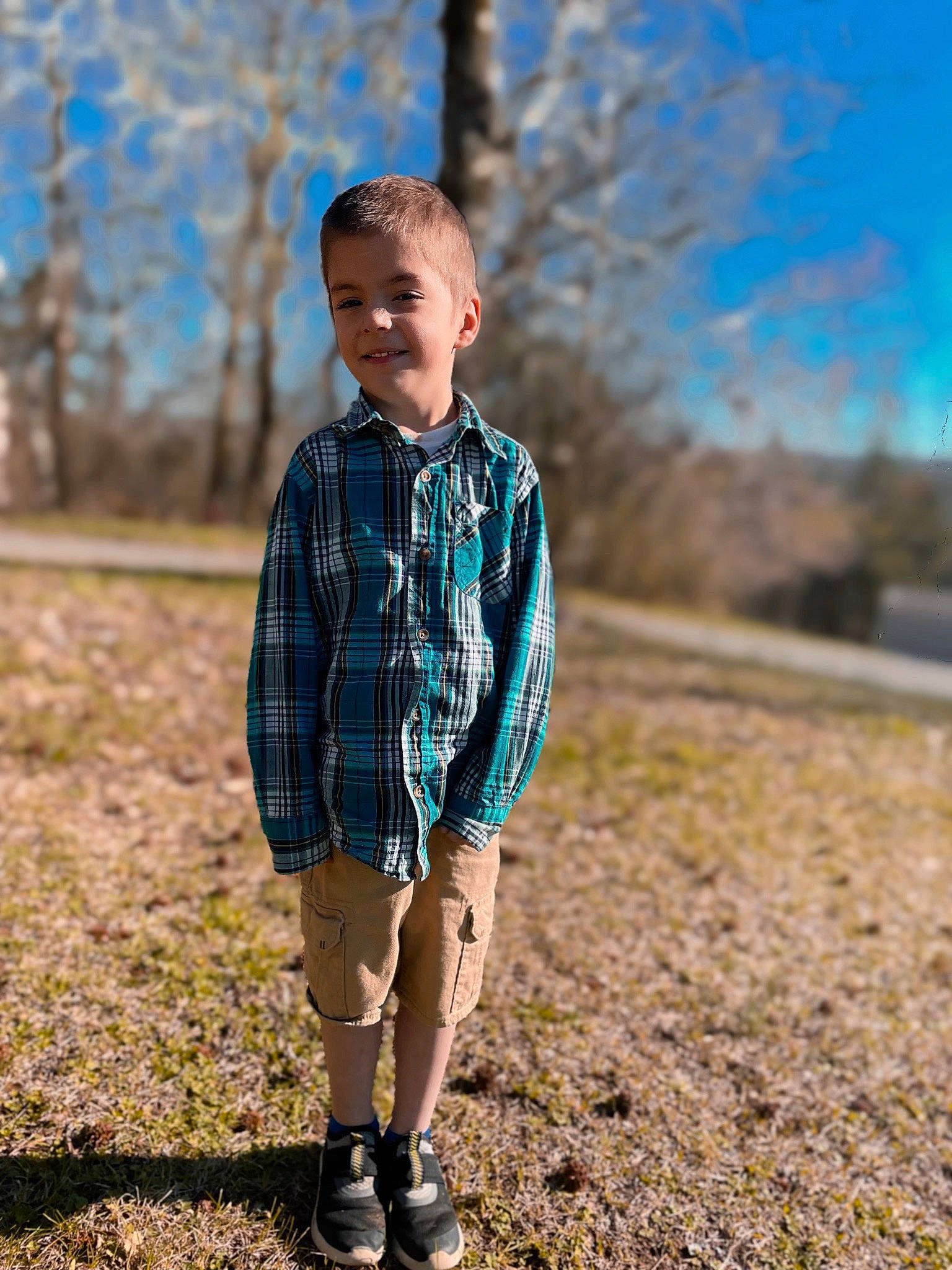 Wyatt joined the competition — help win amazing prizes! electric_blue, eye, flash_photography, grass, hair, happy, joy, landscape, leisure, outerwear, people_in_nature, person, plaid, plant, sky, sleeve, sunlight, tartan, toddler, tree