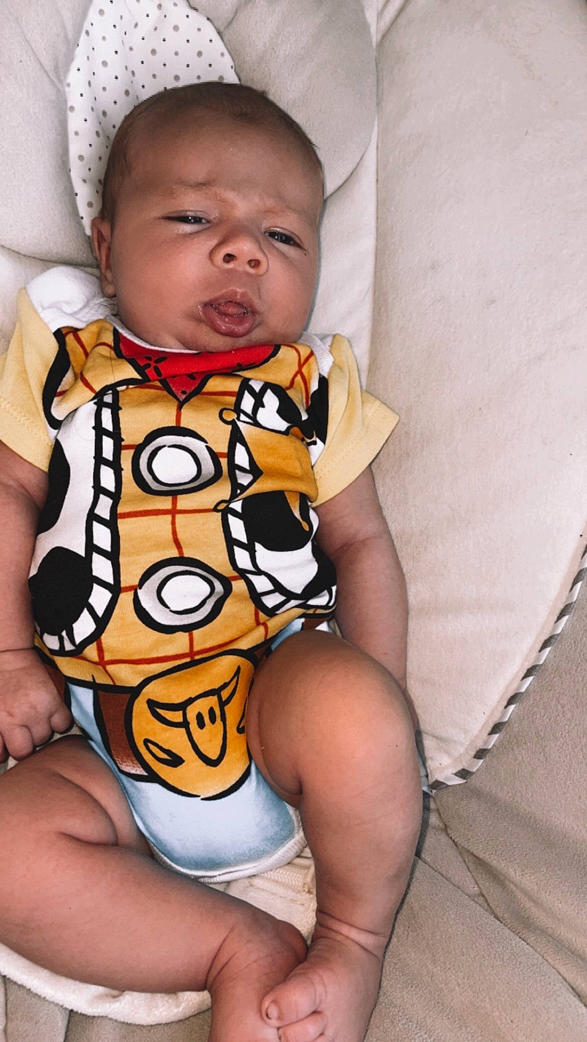 Logan joined the competition — help win amazing prizes! baby, baby_toddler_clothing, cheek, chest, child, comfort, eye, finger, happy, human_leg, knee, neck, pattern, person, sitting, skin, sleeve, stomach, thigh, toddler