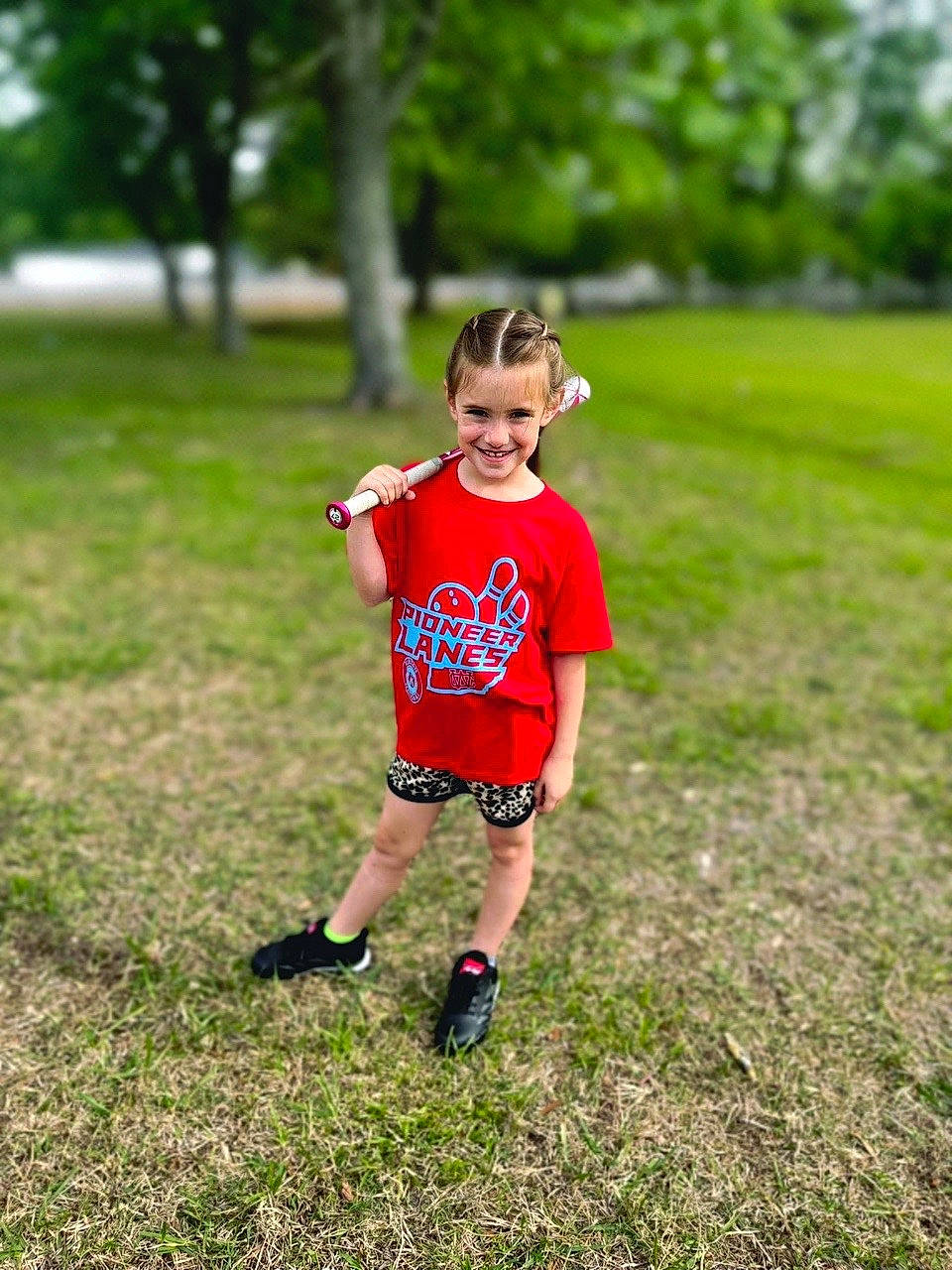 Caelee is registered to the contest to win money with this photo: footwear, fun, grass, grassland, happy, joy, landscape, leisure, meadow, people_in_nature, person, plant, player, recreation, running, shoe, shorts, sneakers, t_shirt, toddler