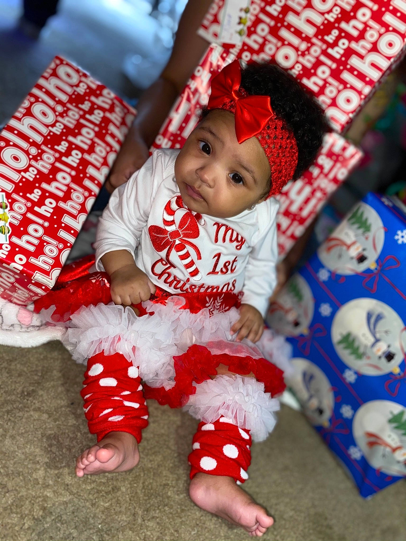 Avani joined the competition — help win amazing prizes! baby, baby_toddler_clothing, child, christmas, foot, headwear, home_accessories, linens, nail, nose, person, play, red, sock, stuffed_toy, toddler