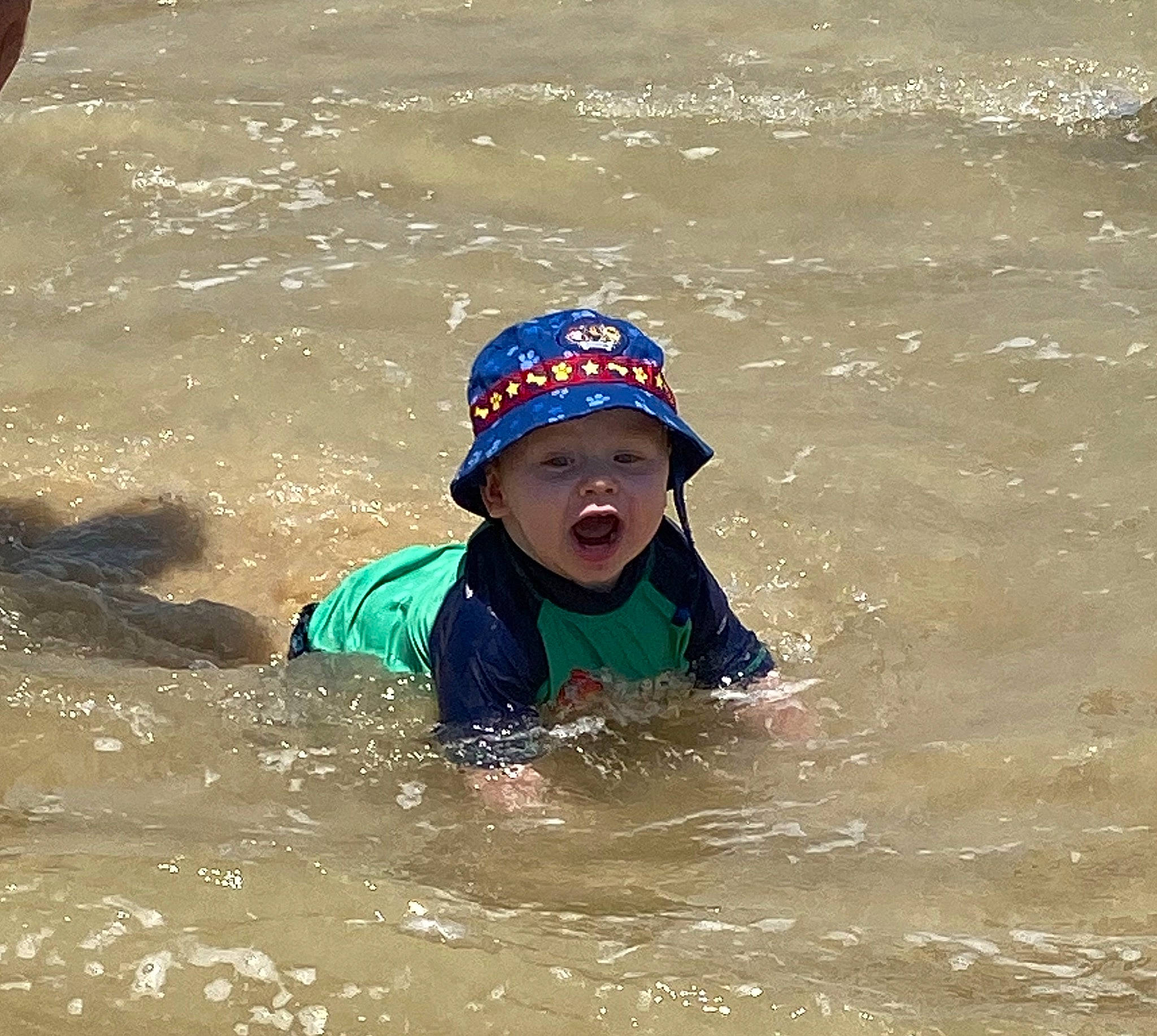 Tex is registered to the contest to win money with this photo: cap, fun, headgear, headwear, leisure, person, play, recreation, smile, swimming, vacation, water