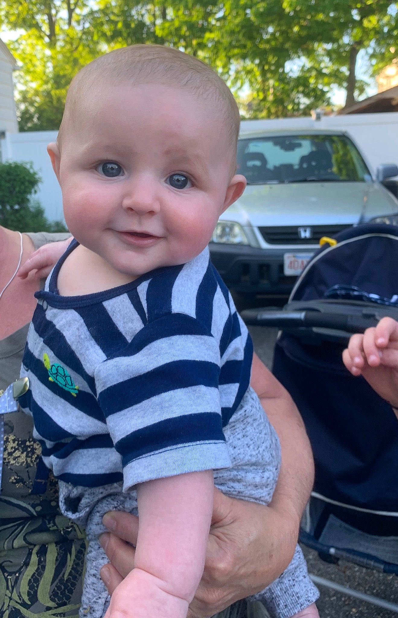 Grady joined the competition — help win amazing prizes! baby, baby_products, baby_toddler_clothing, car, cheek, child, finger, grass, hand, head, joy, leg, person, product, sitting, skin, smile, summer, thumb, toddler
