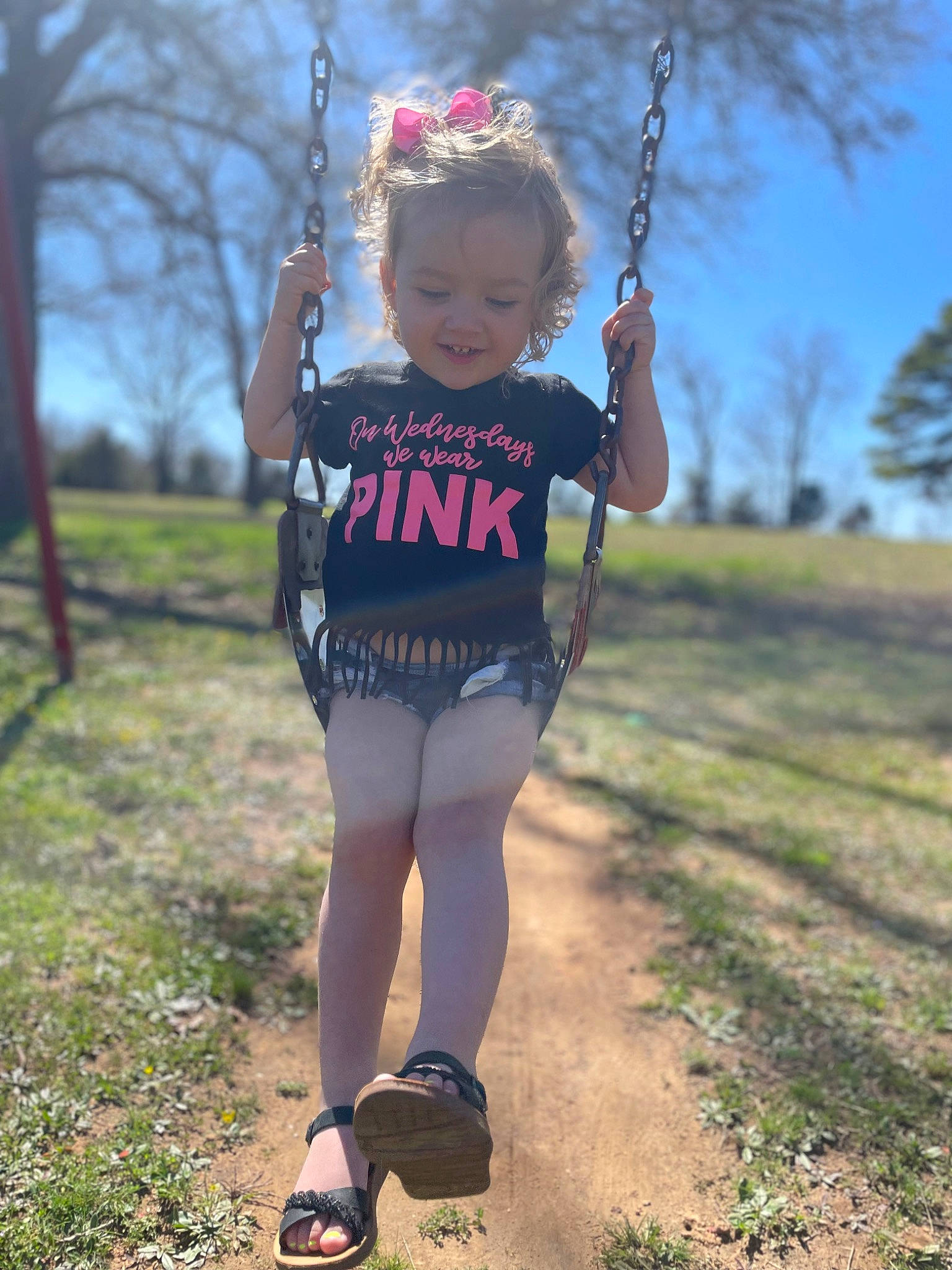 Baylee joined the competition — help win amazing prizes! child, electric_blue, face, fashion_accessory, fun, grass, grassland, happy, jewellery, leisure, person, sandal, sky, sleeve, smile, spring, summer, swing, toddler, tree