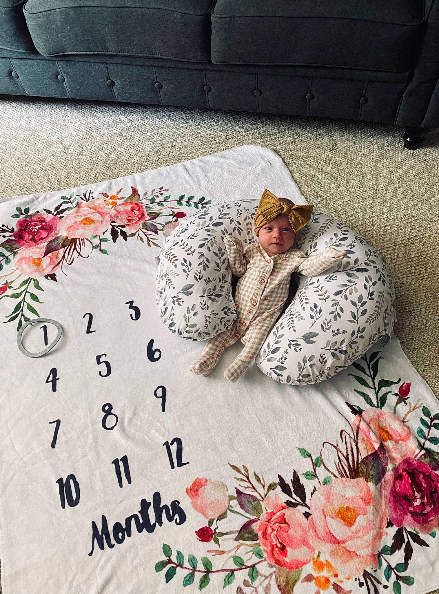 Nora is registered to the contest to win money with this photo: bedding, carmine, comfort, flooring, floral_design, floristry, flower, flower_arranging, font, glasses, happy, headwear, illustration, linens, pattern, peach, person, petal, plant, room