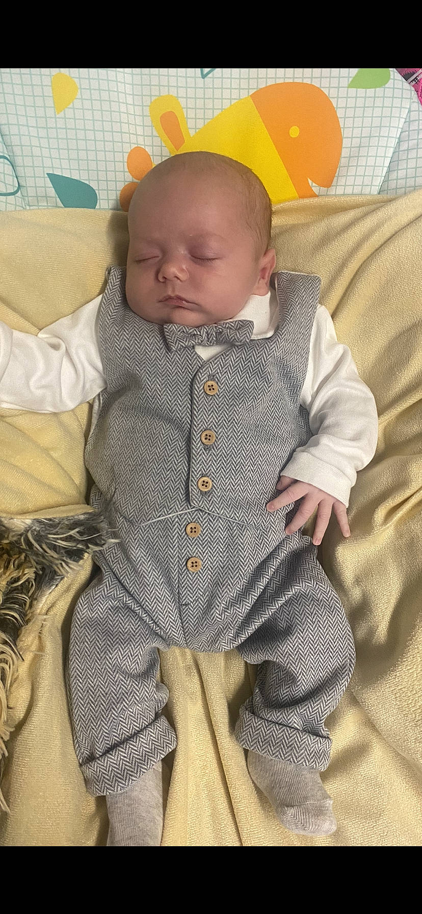 Dylan joined the competition — help win amazing prizes! baby, bodypart, clothing, couch, face, finger, furniture, hand, hat, head, homedecor, hosiery, knitwear, newborn, pants, person, photography, portrait, sock, sweater