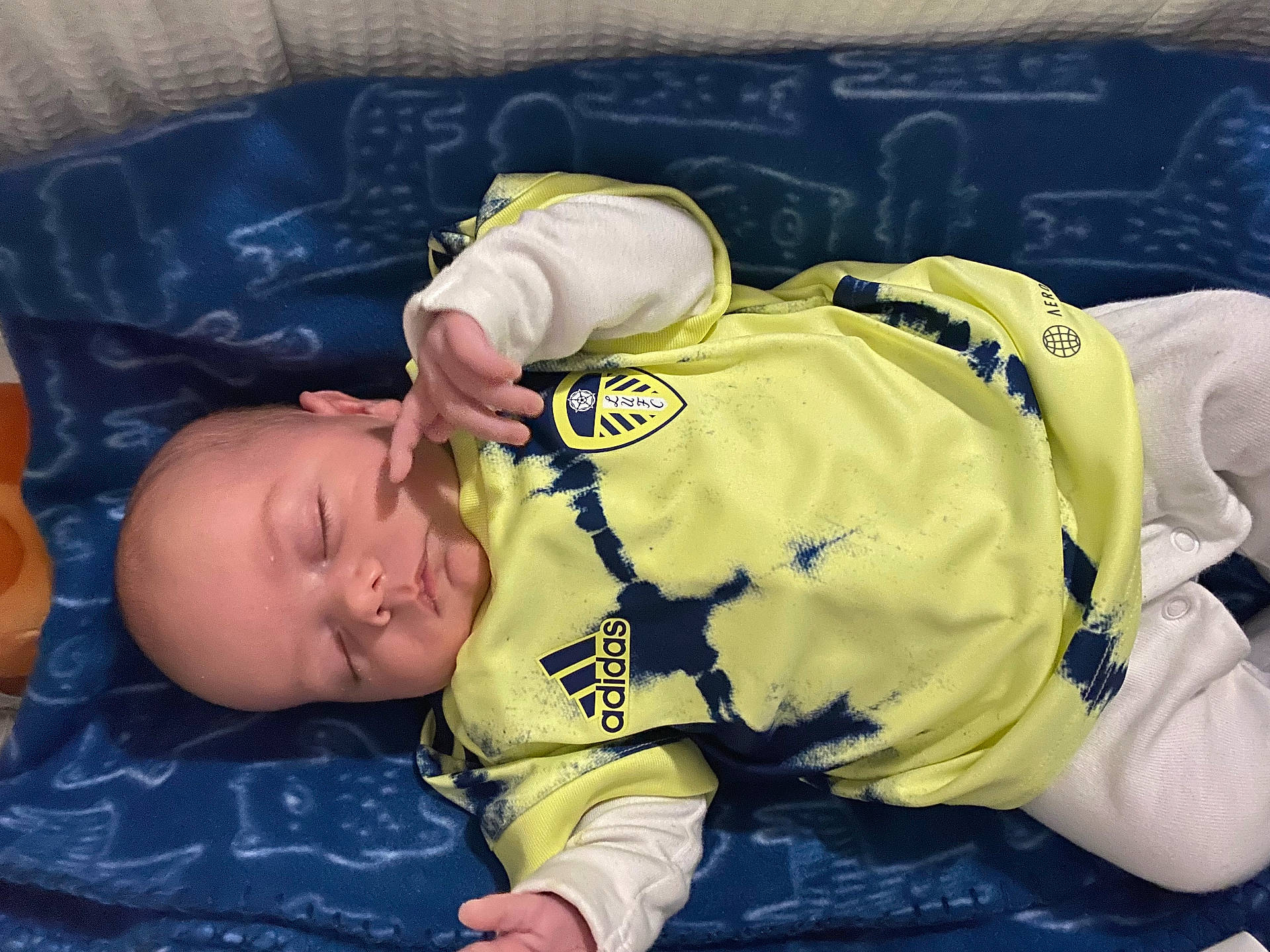 Dylan is registered to the contest to win money with this photo: architecture, baby, bed, blanket, bodypart, building, clothing, cushion, face, finger, furniture, glove, hand, head, hospital, newborn, person, photography, portrait, sleeping