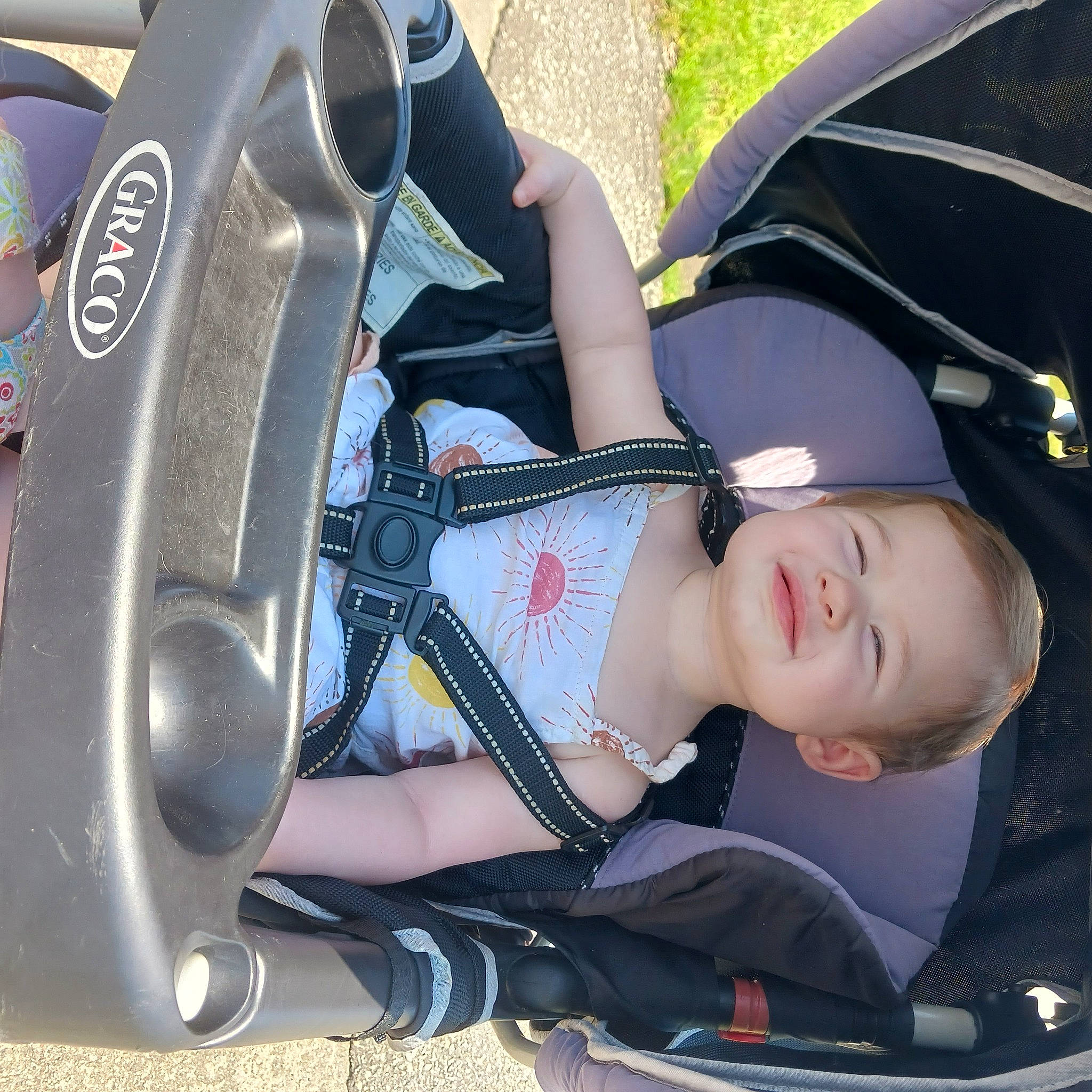 Nova is registered to the contest to win money with this photo: auto_part, automotive_design, automotive_exterior, automotive_lighting, automotive_tire, baby_carriage, bumper, cool, headgear, leg, motor_vehicle, person, personal_protective_equipment, plant, product, recreation, smile, tire, vehicle, vehicle_door