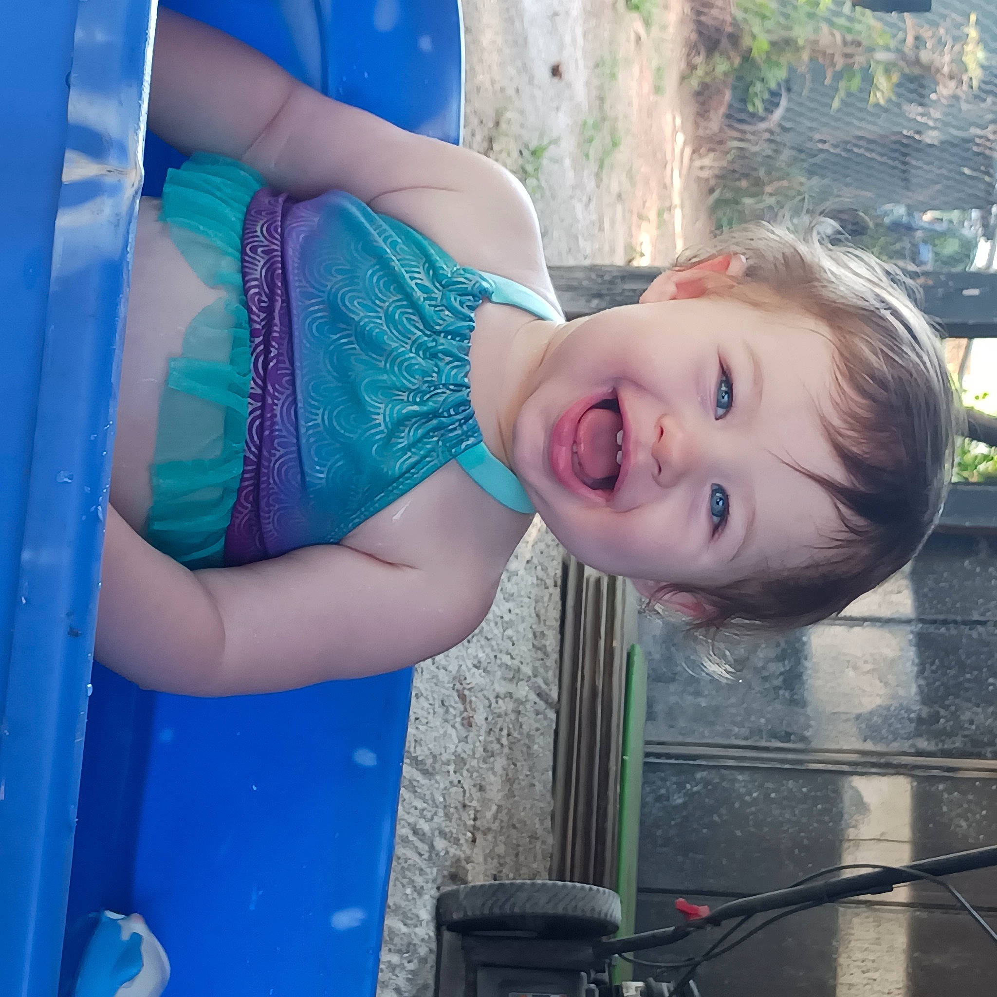 Nova joined the competition — help win amazing prizes! azure, blue, child, electric_blue, fun, grass, happy, human_leg, leisure, person, portrait_photography, recreation, sitting, skin, smile, toddler, vacation, water