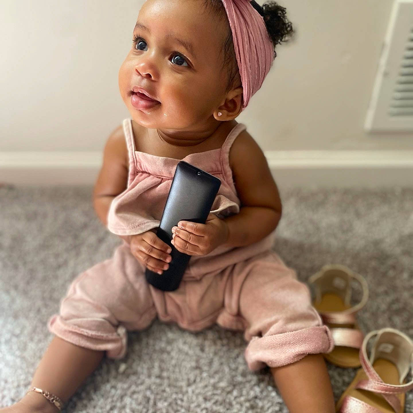 Kalyiah joined the competition — help win amazing prizes! baby, baby_toddler_clothing, cheek, child, communication_device, face, facial_expression, finger, gadget, gesture, hand, happy, head, joint, person, pink, skin, sleeve, thigh, thumb