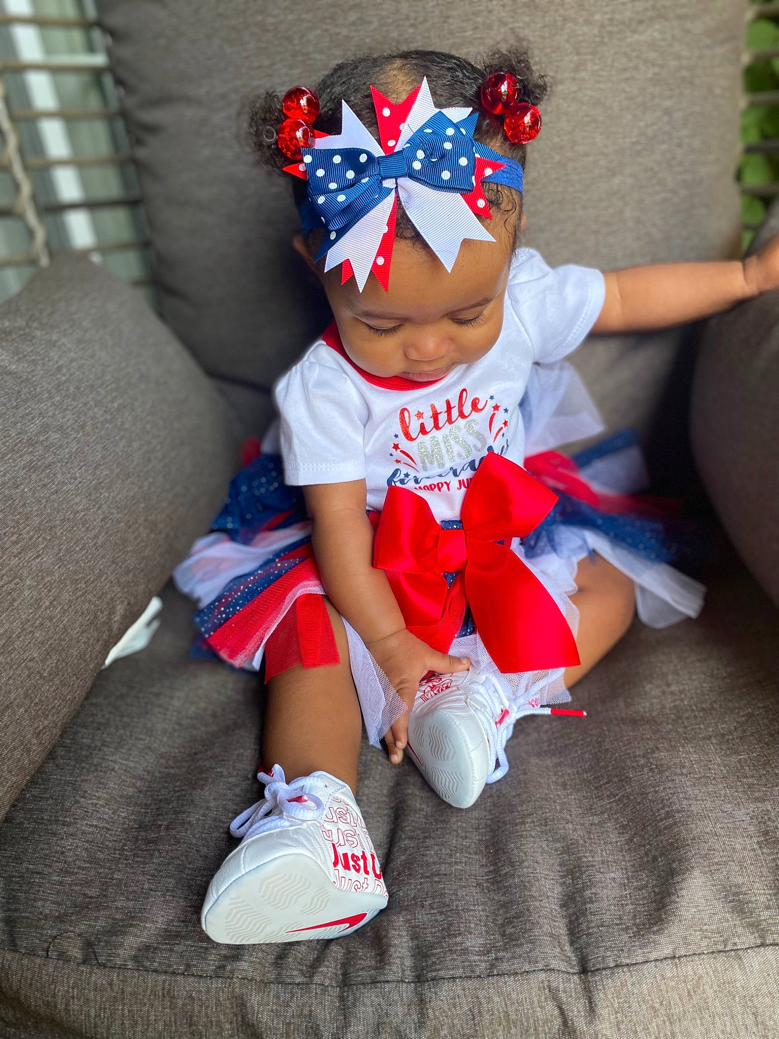 Kalyiah joined the competition — help win amazing prizes! baby_toddler_clothing, cap, carmine, costume_hat, electric_blue, fashion_accessory, happy, hat, headband, headwear, human_leg, knee, pattern, person, pink, sleeve, sock, sportswear, textile, thigh