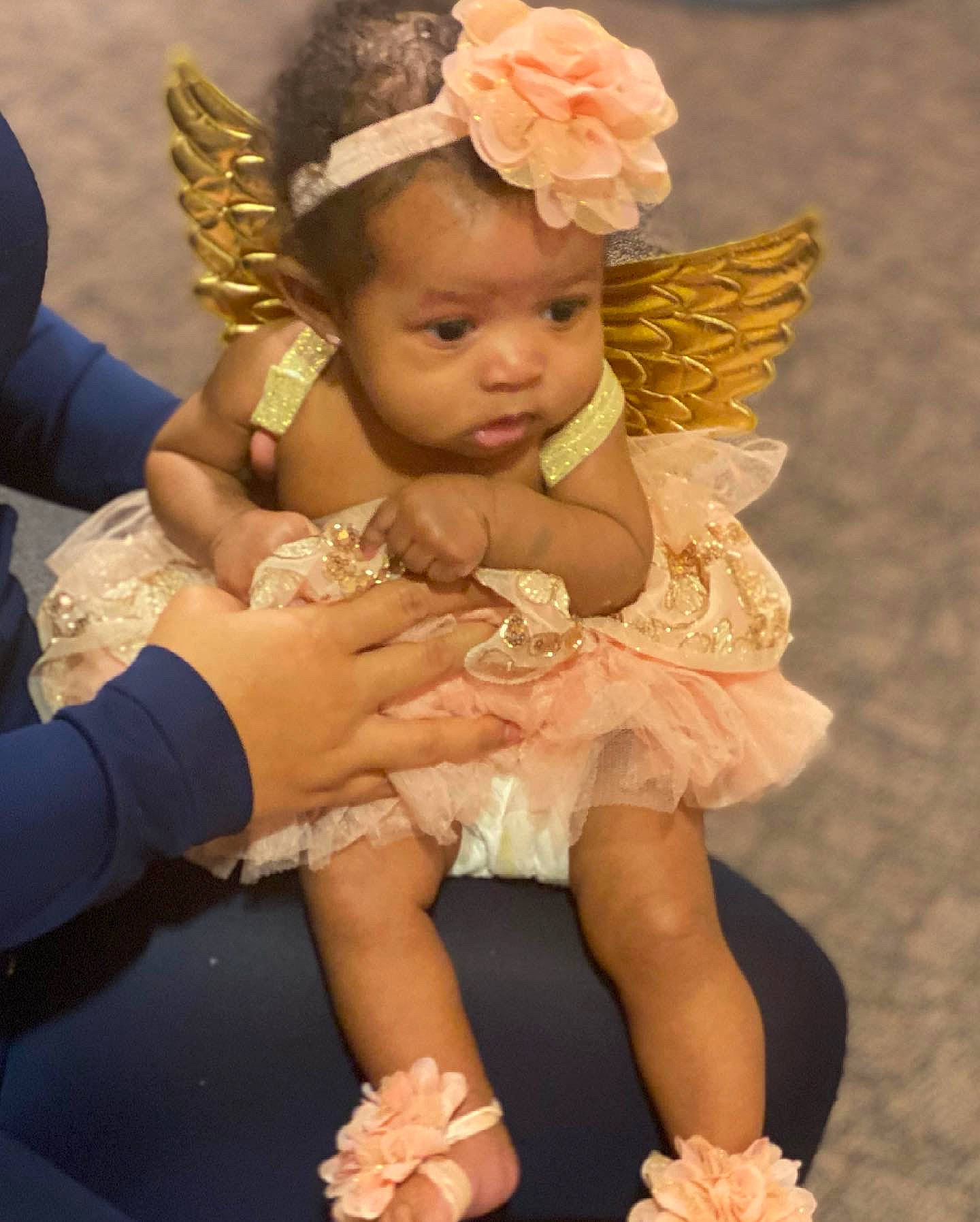 Kalyiah is registered to the contest to win money with this photo: baby, baby_toddler_clothing, bridal_accessory, crown, dress, embellishment, event, flower, hair_accessory, happy, headband, headgear, headpiece, jewellery, mythical_creature, person, petal, pink, skin, toddler