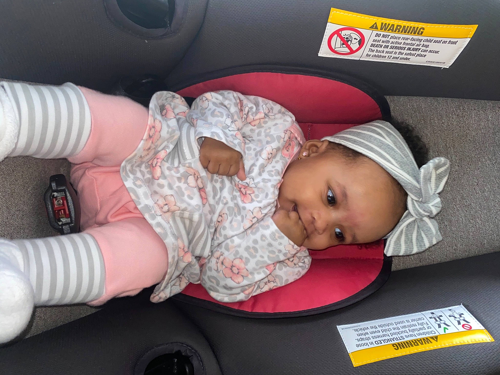 Kalyiah is registered to the contest to win money with this photo: arm, auto_part, baby, baby_carriage, baby_in_car_seat, baby_products, baby_safety, baby_toddler_clothing, beauty, cap, car_seat, child, comfort, finger, hand, hat, headgear, joy, person, product