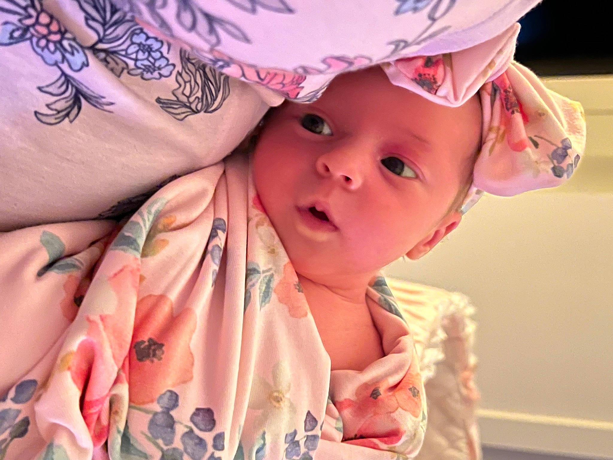 Cecilia is registered to the contest to win money with this photo: baby, baby_toddler_clothing, beauty, child, eyelash, fashion_accessory, gesture, happy, hat, headpiece, headwear, human_leg, lip, magenta, pattern, peach, person, petal, pink, skin