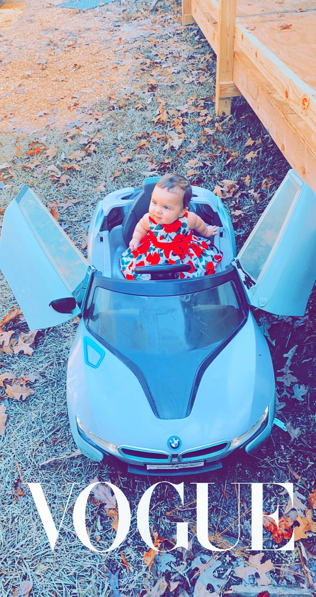 Grayson is registered to the contest to win money with this photo: automotive_design, automotive_exterior, automotive_lighting, automotive_tire, automotive_wheel_system, bumper, car, electric_blue, fender, fun, hood, leisure, motor_vehicle, person, recreation, rim, snapshot, toddler, vehicle, wheel