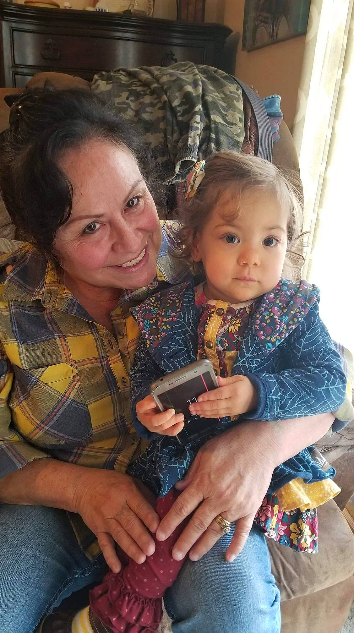 Mavis is registered to the contest to win money with this photo: child, iris, joy, lap, people, person, sibling, smile, toddler