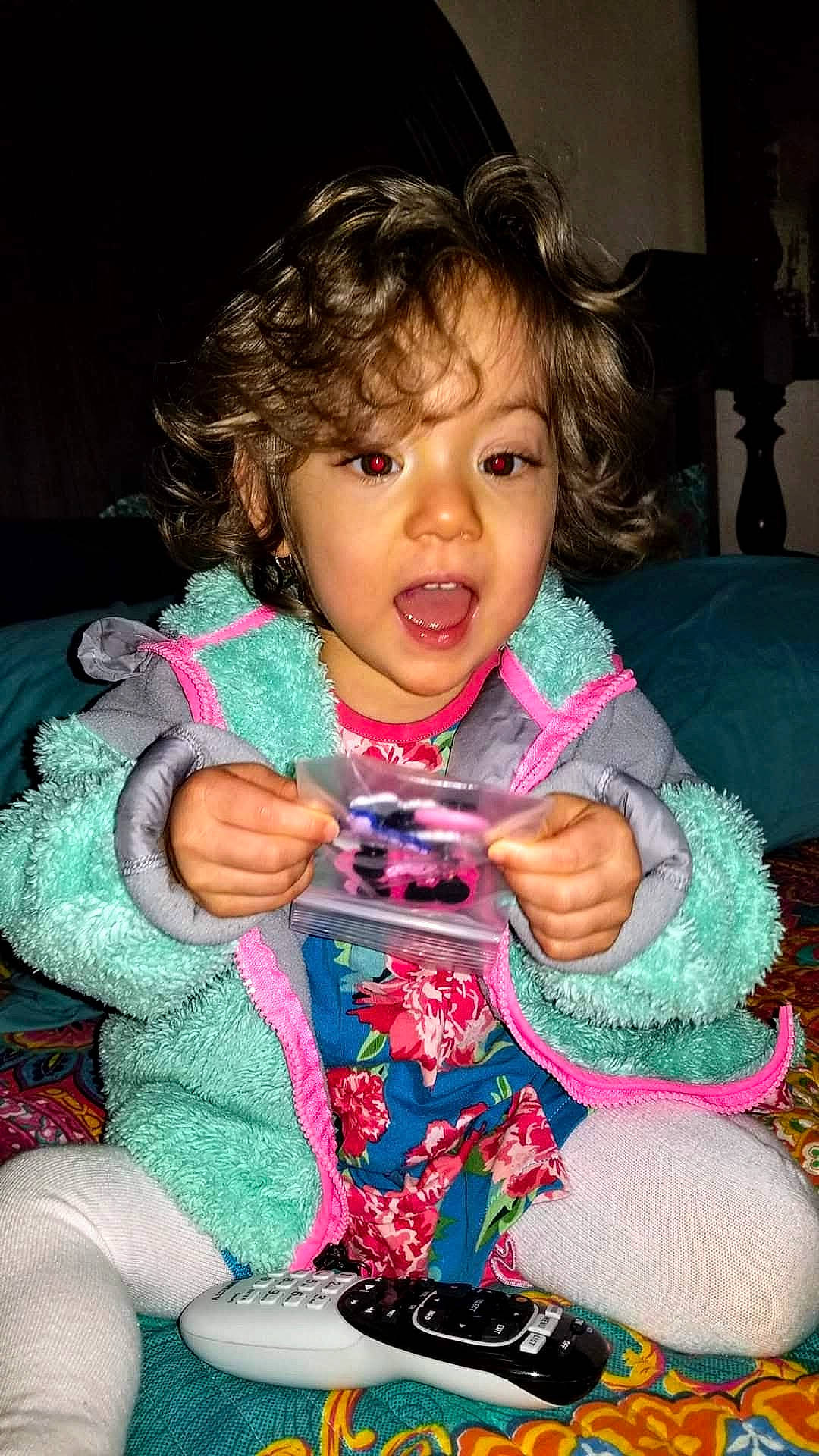 Mavis is registered to the contest to win money with this photo: baby, cheek, child, person, play, sitting, smile, surprise, toddler