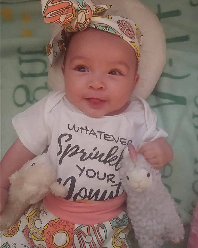 Odessa joined the competition — help win amazing prizes! baby, baby_toddler_clothing, cheek, child, fashion_accessory, hair_accessory, head, headgear, headwear, person, pink, sleeve, smile, toddler