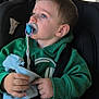 éren participe au concours pour gagner de l'argent avec cette photo : toddler, child, pacifier, green_hoodie, car_seat, blanket, blue_eyes, car_interior, seatbelt, window, daylight, clothing, hand, face, looking_away, young_child, casual_wear, transportation, safety, portrait