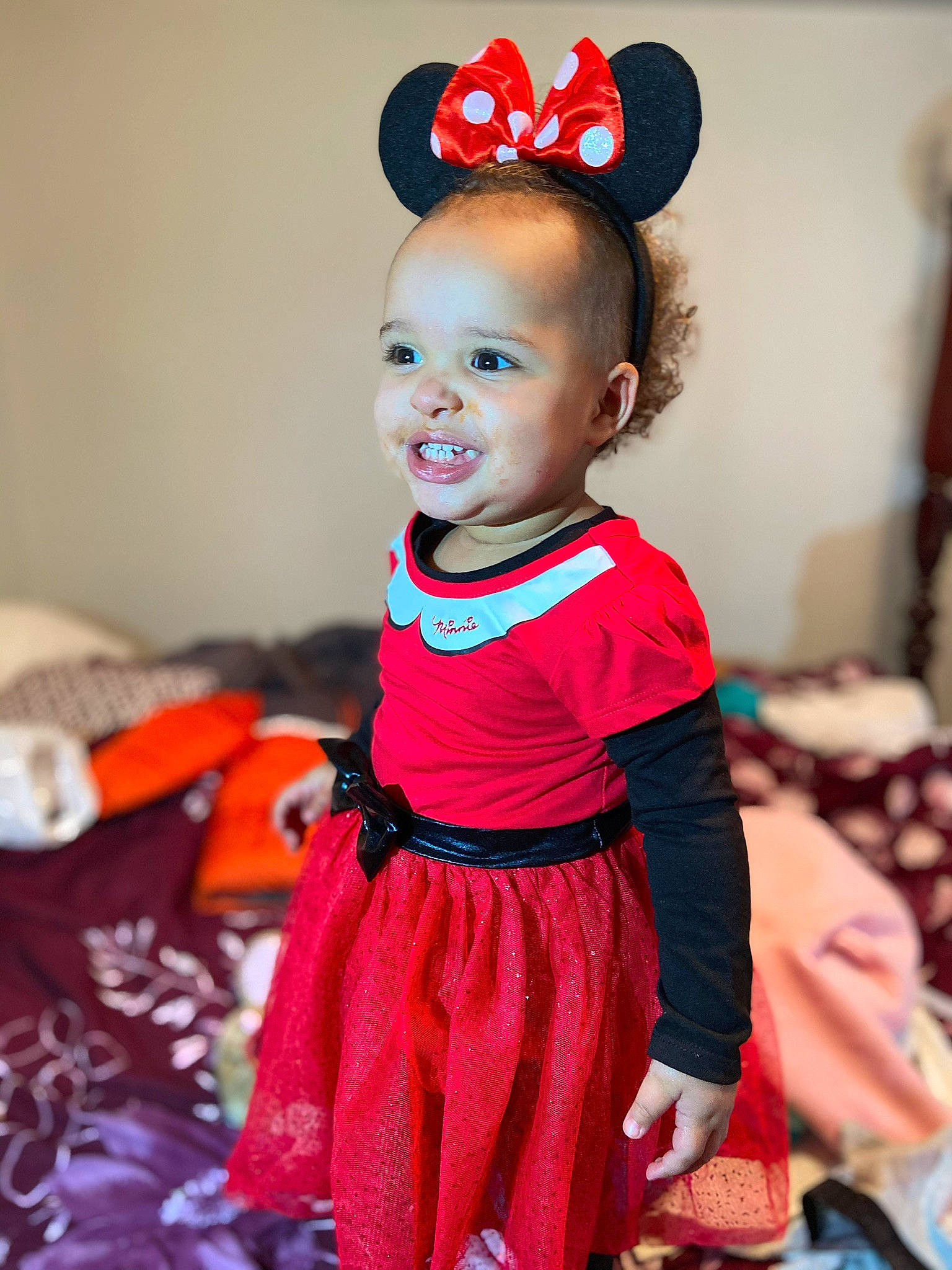 Azalea joined the competition — help win amazing prizes! baby_products, baby_toddler_clothing, child, clothing, costume, design, dress, hair_accessory, headband, pattern, person, red, smile, toddler