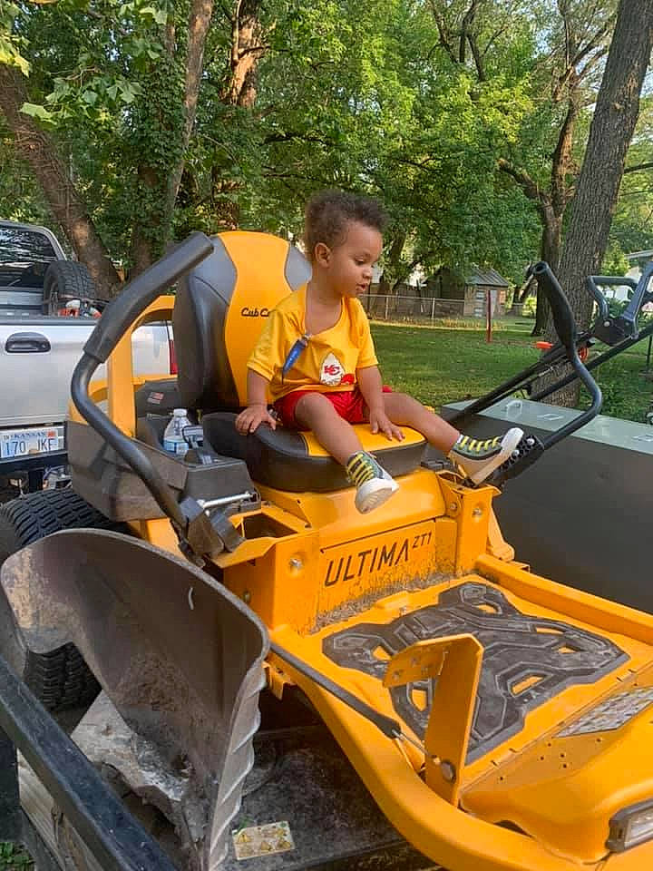 Landyn joined the competition — help win amazing prizes! asphalt, automotive_design, automotive_exterior, automotive_lighting, automotive_tire, automotive_wheel_system, bumper, fender, grass, helmet, hood, motor_vehicle, outdoor_recreation, person, plant, recreation, road_surface, tire, tree, vehicle