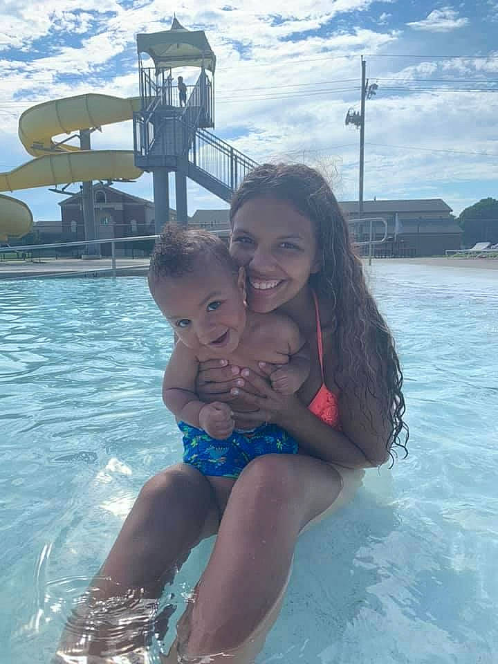 Landyn joined the competition — help win amazing prizes! azure, body_of_water, brassiere, cloud, face, fun, hand, happy, joy, leisure, organ, person, recreation, sky, smile, summer, swimming_pool, swimwear, thigh, toddler