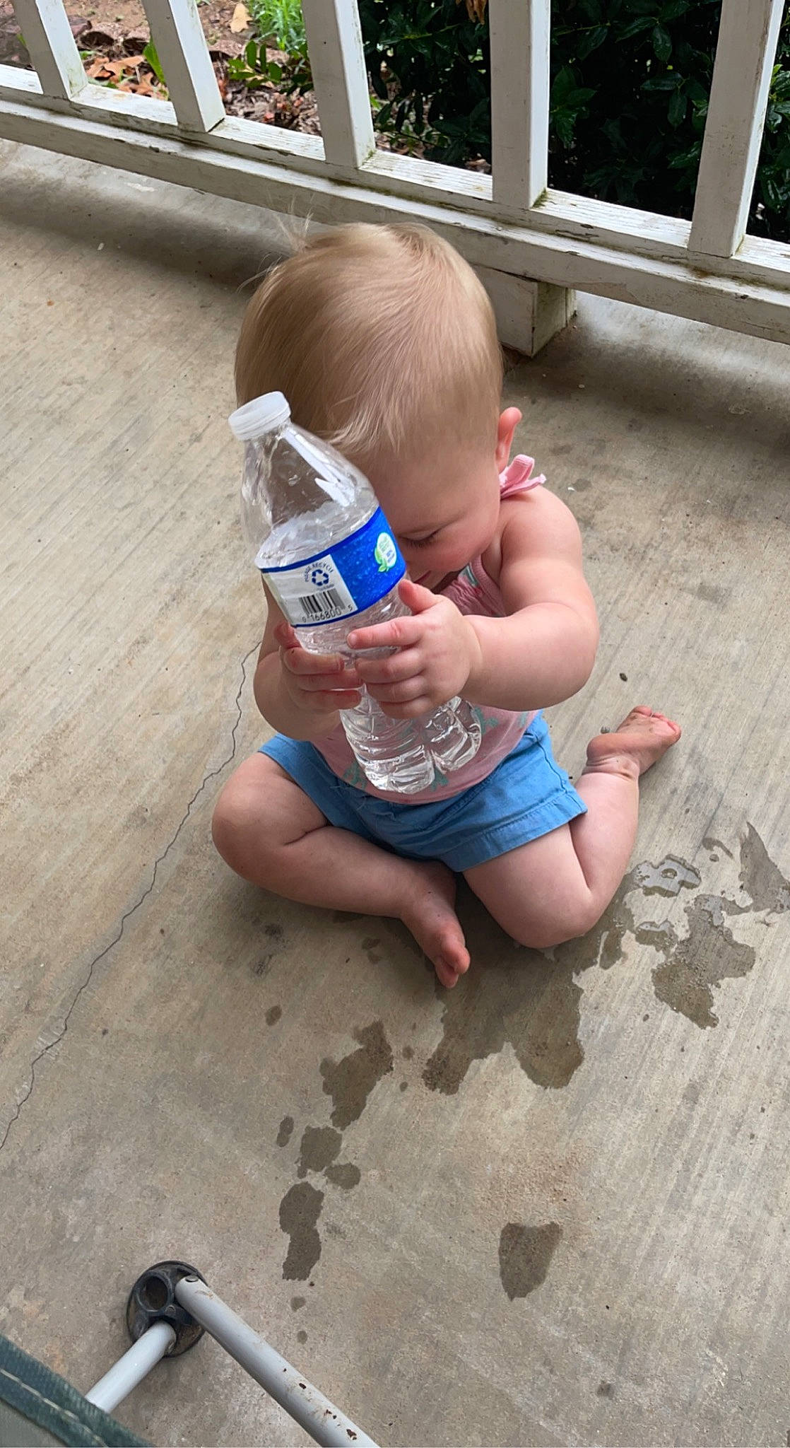 Braylee joined the competition — help win amazing prizes! baby, baby_toddler_clothing, barefoot, child, drinking_water, drinkware, finger, flooring, foot, fun, head, human_leg, leisure, person, plastic_bottle, sitting, thumb, toddler, water, water_bottle