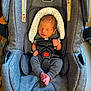 Marcus joined the competition — help win amazing prizes! newborn, baby, car_seat, evenflo, infant, sleeping, child, straps, grey, fabric, footwear, tiny_feet, head_support, cushion, indoors, person, safety, comfort, portrait, baby_clothes