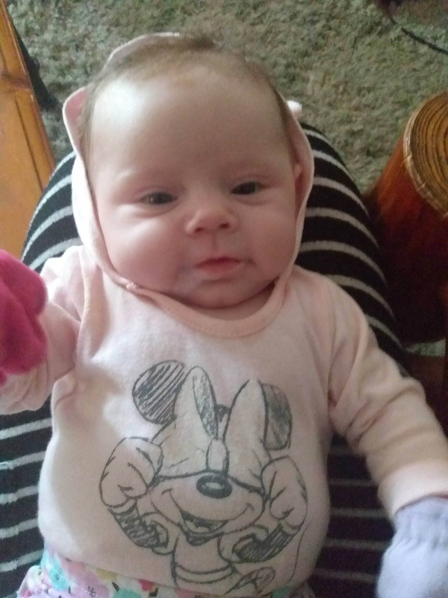 Aria is registered to the contest to win money with this photo: arm, baby, baby_toddler_clothing, cheek, ear, eye, eyebrow, forehead, hairstyle, head, iris, lip, mammal, mouth, neck, nose, organ, person, skin, sleeve