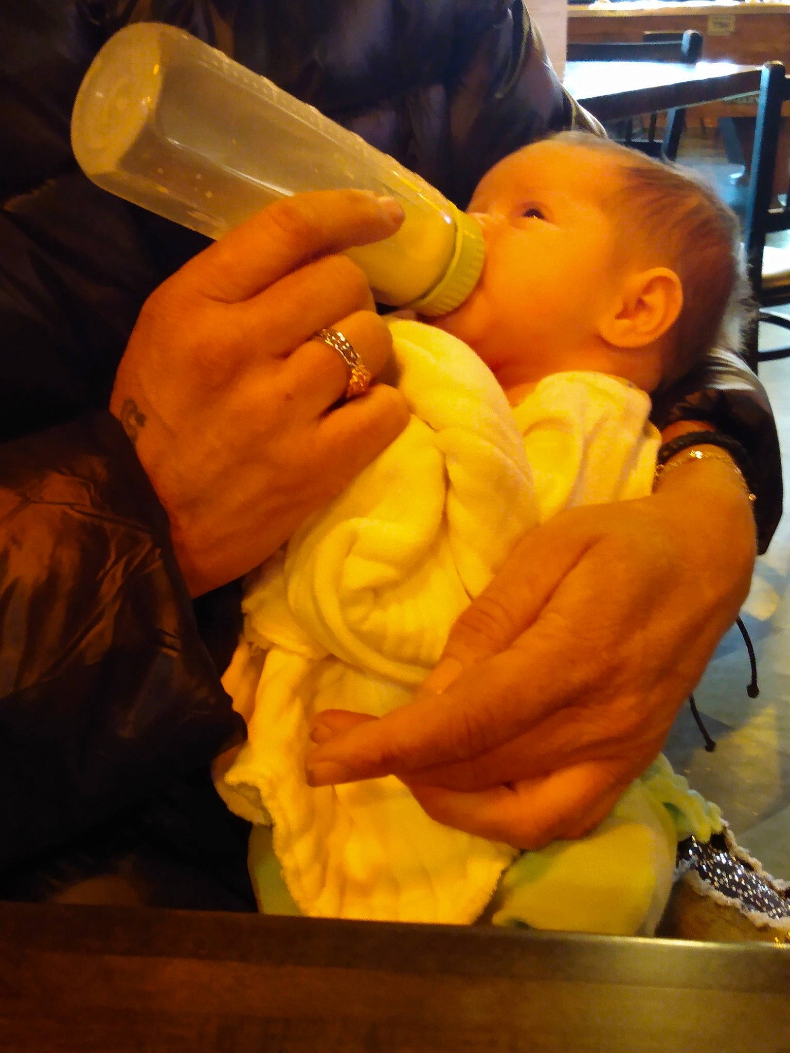 Aria joined the competition — help win amazing prizes! baby, baby_bottle, bottle, child, comfort, drink, drinking, drinkware, elbow, finger, gesture, infant_formula, nail, person, plastic_bottle, sitting, skin, television, thumb, toddler