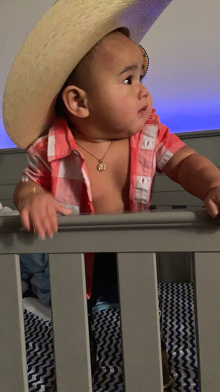 Jamezi is registered to the contest to win money with this photo: baby, cap, chin, costume_hat, cowboy_hat, eyelash, face, fedora, fun, gesture, happy, hat, lip, mouth, nose, organ, person, product, skin, sun_hat